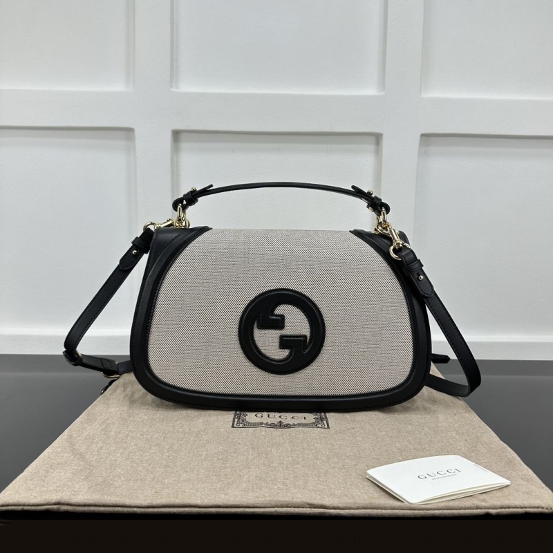 G*u*i top handle bags